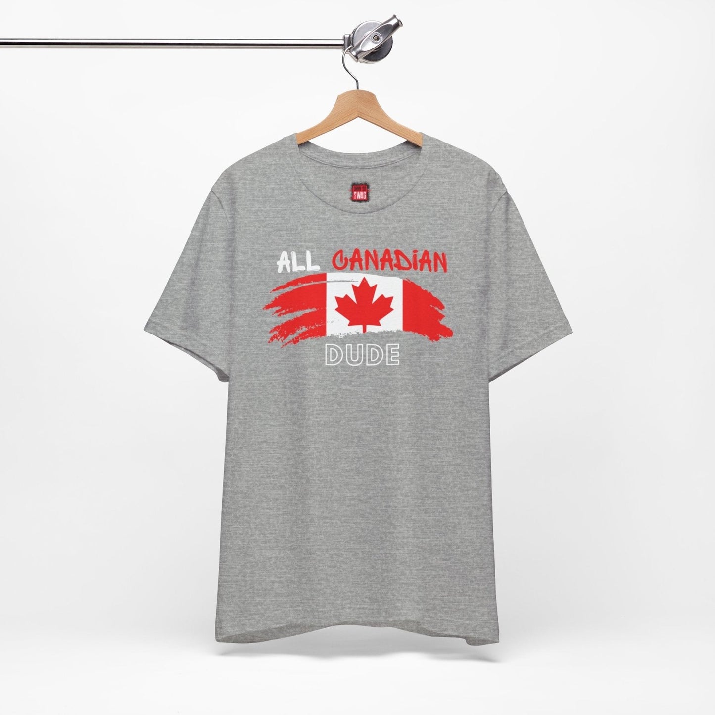 Young man wearing an Ohhh So Swag heather gray t-shirt with a Canada flag and All Canadian Dude text hanging on a hanger | Ohhh So Swag